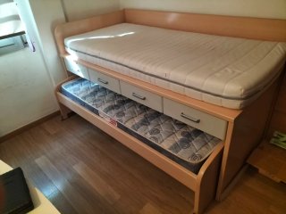 Cama nido doble con cajones.