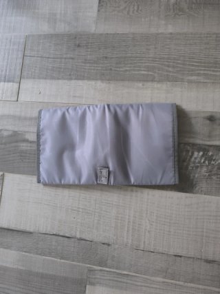 Cambiador de bebé plegable gris