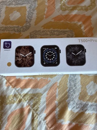 Smartwatch rosa con cargador