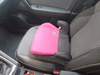Silla elevador coche rosa y negro