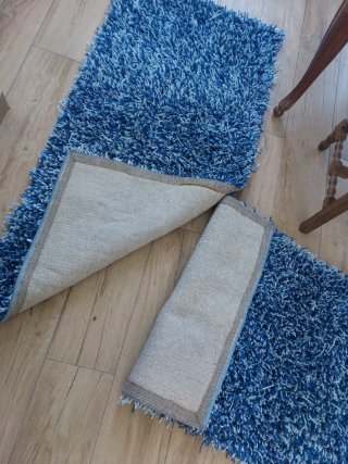Pareja de alfombras azules