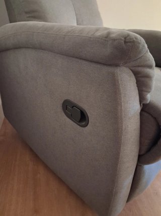 Sillón reclinable gris de tela. Como nuevo