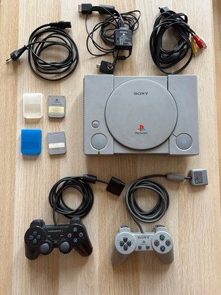 Consola PlayStation 1 (PSX) con accesorios