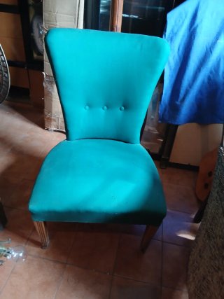 Poltroncina in tessuto color petrolio