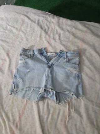 Falda pantalón vaquera desgastada
