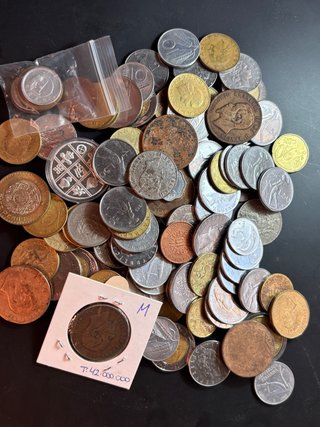 Lote de casi 1 kg de monedas internacionales