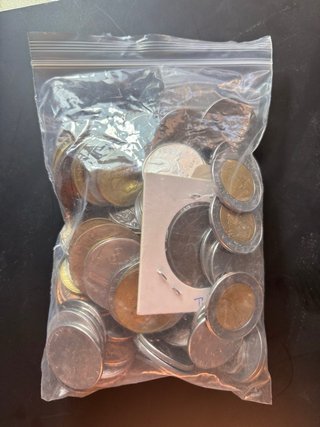 Lote de casi 1 kg de monedas internacionales