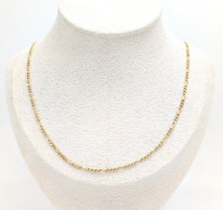 Cadena Figaro de oro de 18k, 7.84 g, 61 cm.