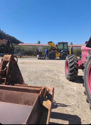 Retroexcavadora New Holland LB115C