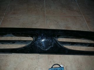Embellecedor Nissan micra alpine y chapa embellece