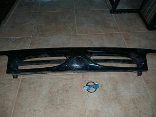 Embellecedor Nissan micra alpine y chapa embellece