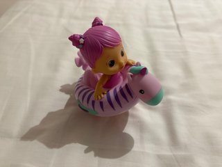 Muñeca de baño con flotador de cebra