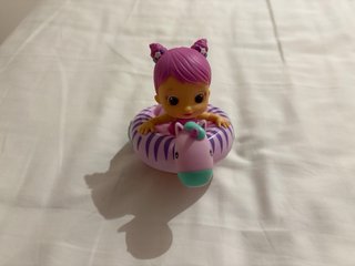Muñeca de baño con flotador de cebra