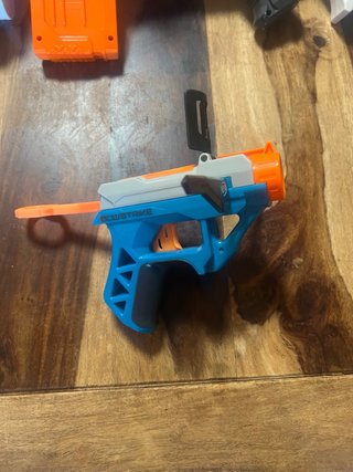 Pistola Nerf Azul y Naranja