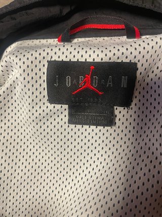 Chaqueta Jordan Talla M/L Negra y Dorada
