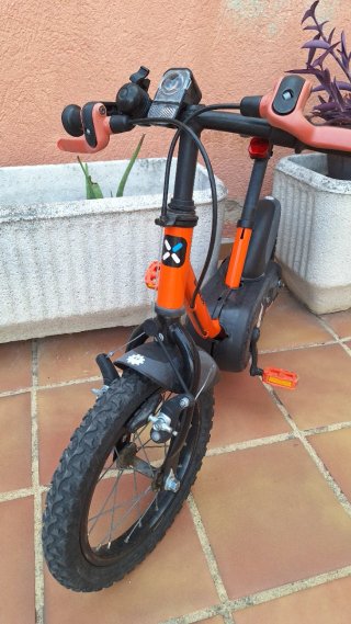 Bicicleta infantil Btwin naranja. 3-5 años