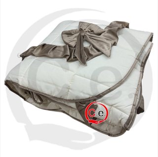 Trapunta con cuscino a fiocco