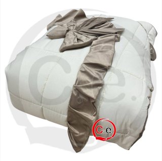 Trapunta con cuscino a fiocco