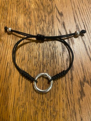 Pulsera TOUS de cordón negro y aro de plata