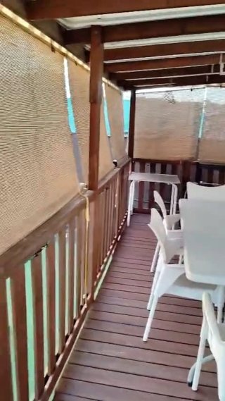 Móvilhome 9 x 4 con porche de madera de 6 x 3