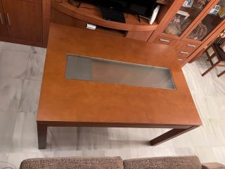 Mesa de comedor extensible madera y cristal.