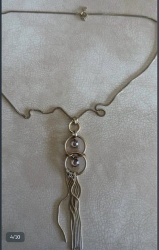 Collar fantasía con colgante de aros y cuentas