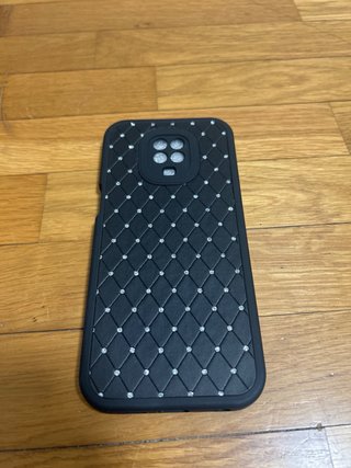 Funda móvil negra con brillantes