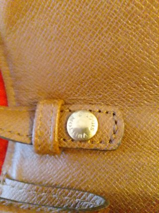 Pochette Louis Vuitton Bordeaux original.