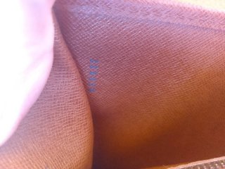 Pochette Louis Vuitton Bordeaux original.