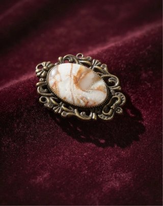 Anillo de arcilla con diseño