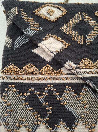 Bolso de mano con cadena