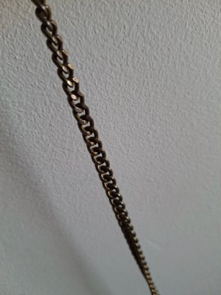 Bolso de mano con cadena