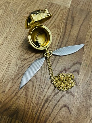 Snitch Dorada Harry Potter con Piedra Resurrección
