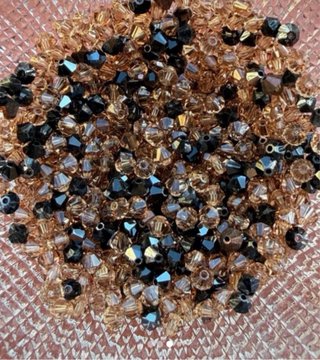 Abalorios Swarovski Dorados y Negros