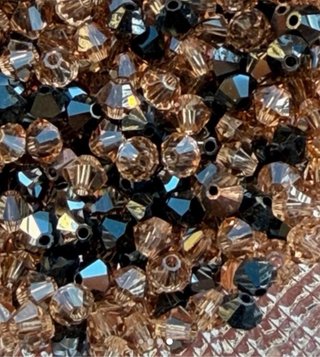 Abalorios Swarovski Dorados y Negros