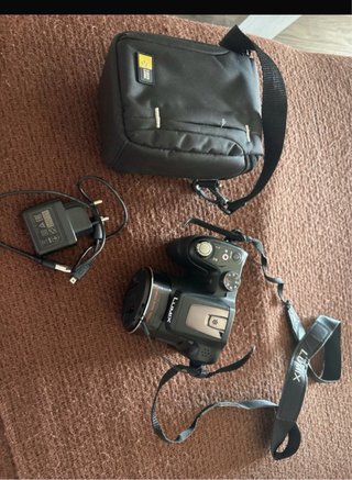 Camara reflex panasonic y funda