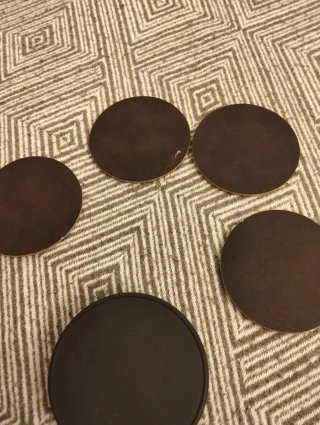 Posavasos antiguos con escudo