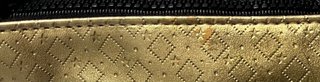 Necessaire dorato Yves Saint Laurent