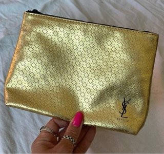 Necessaire dorato Yves Saint Laurent