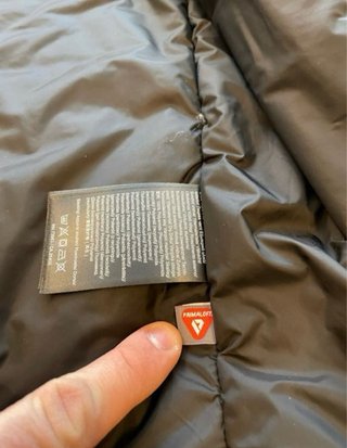 320€-->170€ Cazadora Helly Hansen Negra nueva