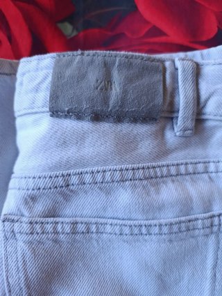 Pantalón vaquero campana desgastado
