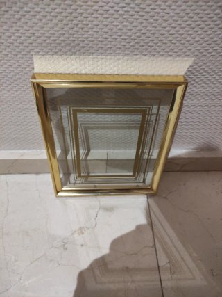 Marco dorado con cristal