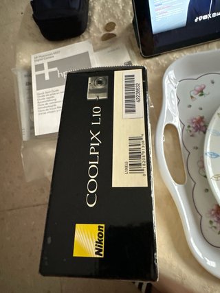 Caja Nikon Coolpix L10