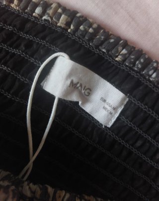 Falda corta con estampado de mariposas