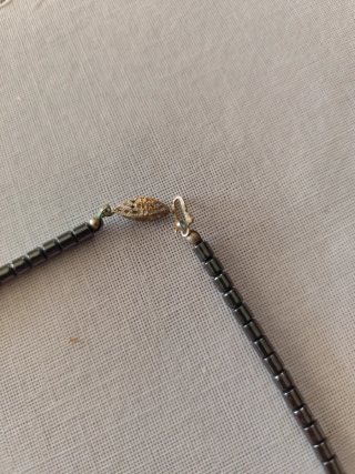 Collana in ebanite con ciondolo a pesce