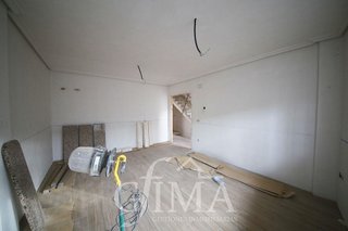 Casa adosada en venta en Tomelloso