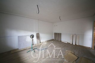 Casa adosada en venta en Tomelloso
