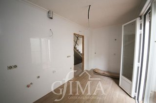 Casa adosada en venta en Tomelloso