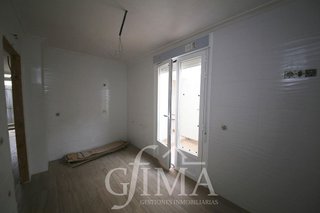 Casa adosada en venta en Tomelloso
