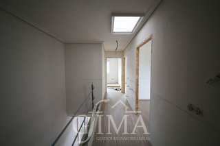 Casa adosada en venta en Tomelloso
